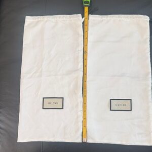 Two Gucci shoe dust bags new without tags